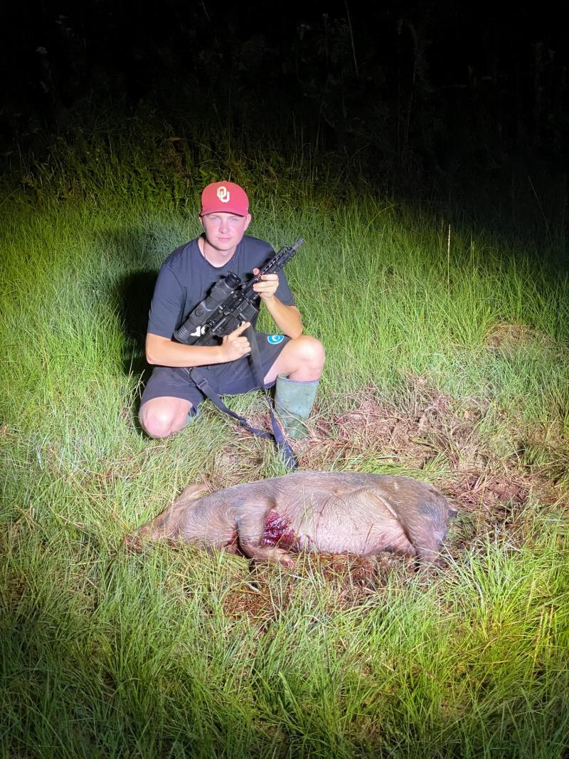 Hunter With Harvested Hog - Hunts in Oklahoma for Wild Boar