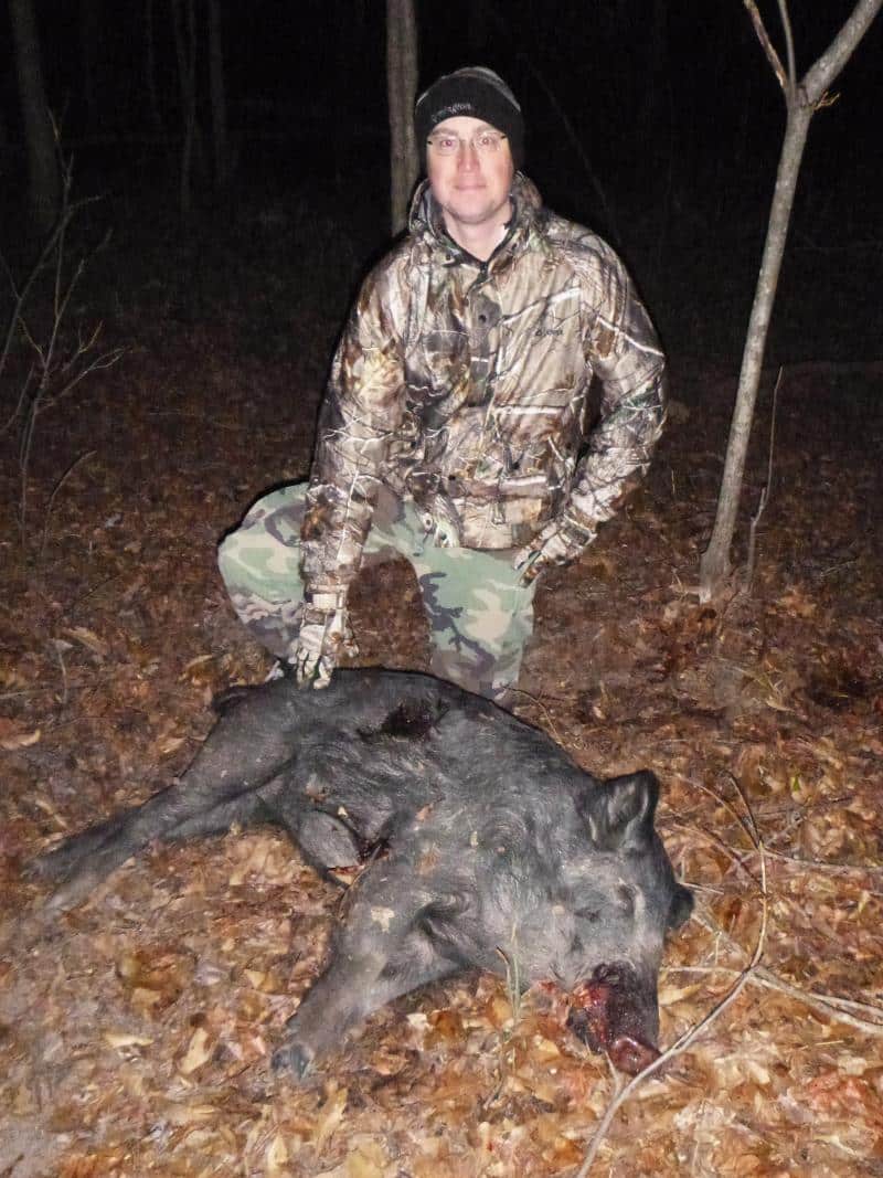 Wild Boar Hunt - Hunter with Hog at Feeder - Oklahoma Hog Hunt - Hog Hunting OK
